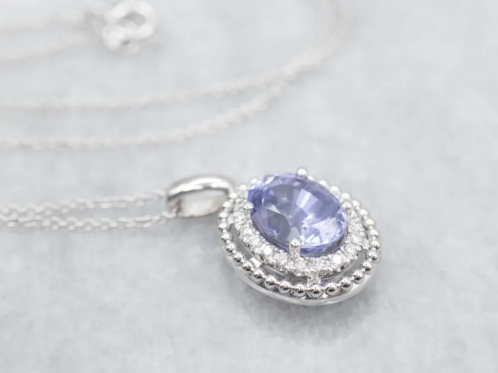 Sapphire and Tweeling Diamond Halo Pendant Necklace