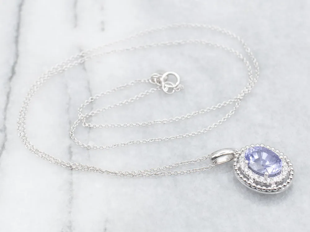Sapphire and Tweeling Diamond Halo Pendant Necklace
