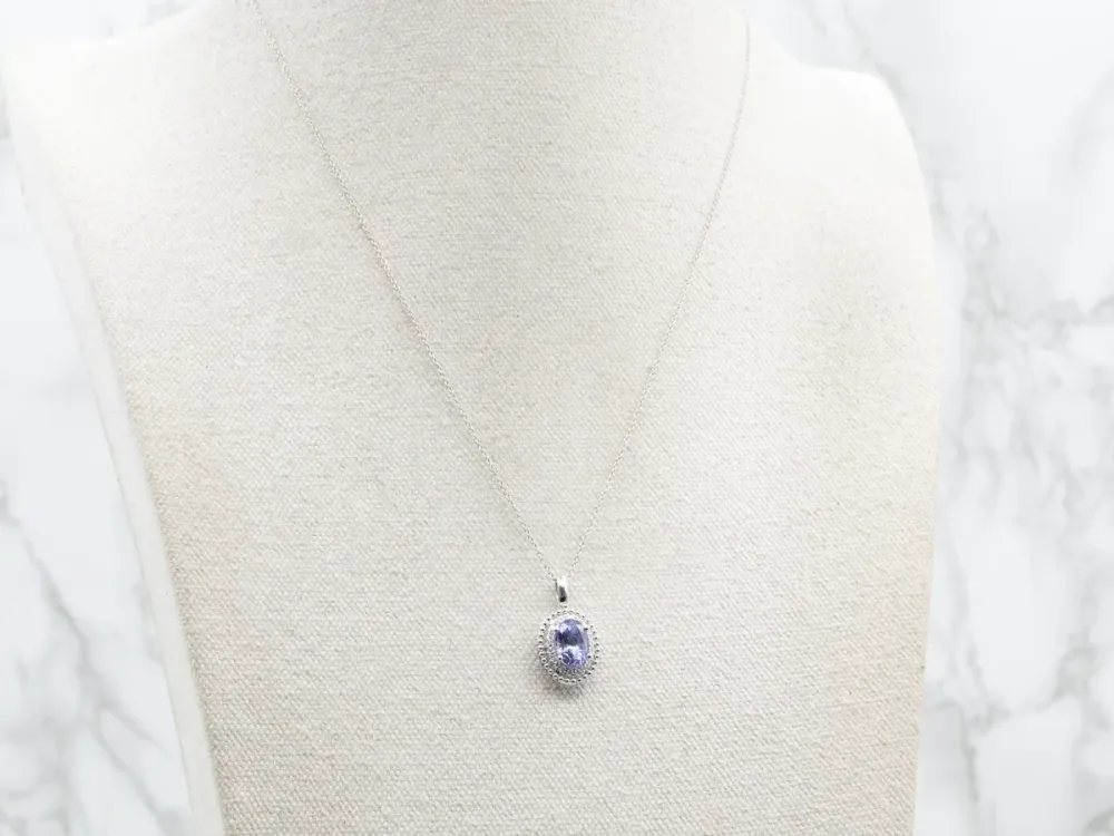 Sapphire and Tweeling Diamond Halo Pendant Necklace