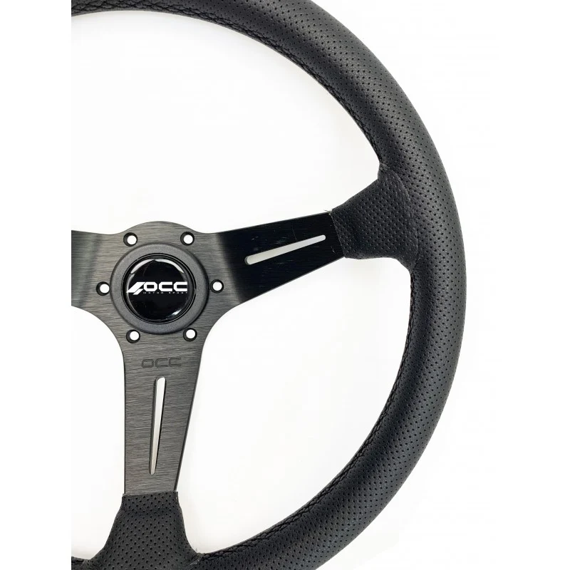 VOLANTE DESPLAZADO MOD. TRADITIONEEL PIEL PERFORADA BRAZOS NEGROS OCC MOTORSPORT